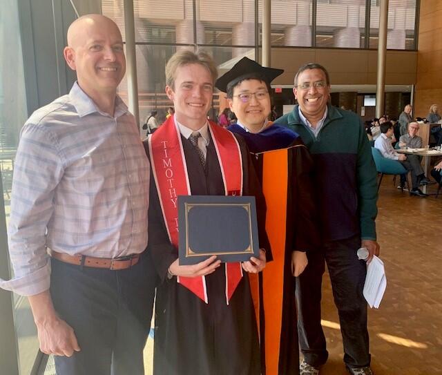 Recent graduates smiling